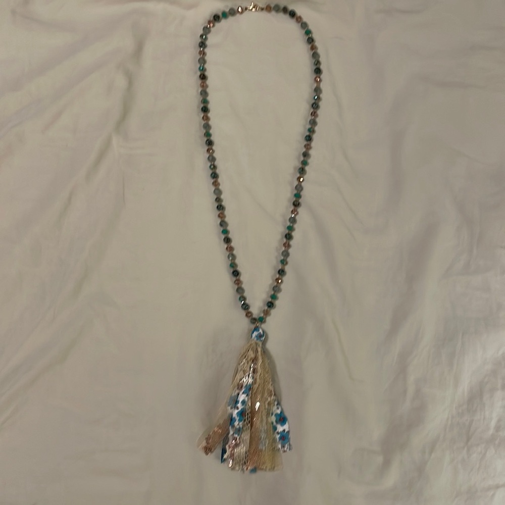 Bead and fabric tassel necklace.